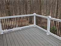 <b>Timbertech Terrain Silver Maple with White Vinyl Washington Railing with Black Round Aluminum Balusters</b>